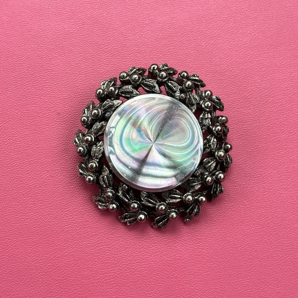 VTG Jewelarama holographic disc brooch silver-tone floral wreath frame